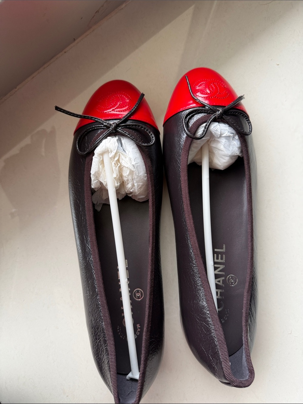 CHANEL Two-Tone Red Cap-Toe Brown Ballet Flats
